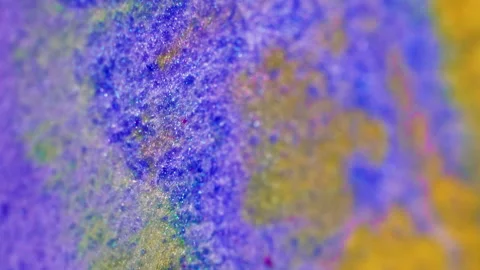 Sparkling paint flow ink splash purple yellow wave Stock Footage 282115163