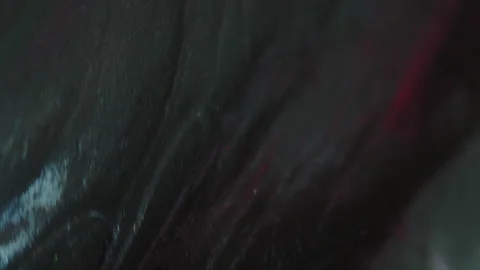 Sparkling paint smooth texture black pink luminous Stock Footage 283521945