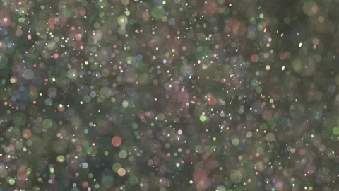 The sparkling particles floating on the dark background. slow motion Stock Footage 160063375