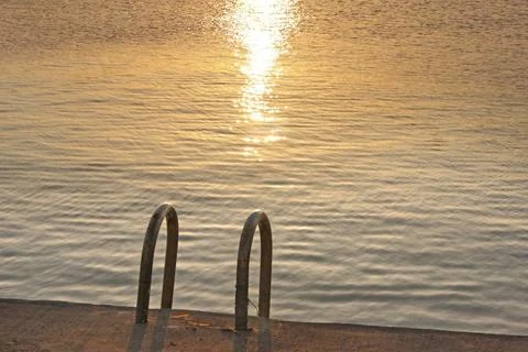 The sparkling reflection of sunlight on the sea at the remote port in Taiwan. Stock Photos