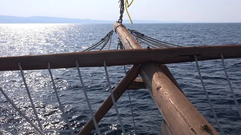 Sparkling sea and bowsprit  at the bow of a  moving sailboat stock footage Stock Footage 116265953