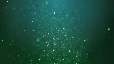 Sparkling silver bokeh particles falling... | Stock Video | Pond5