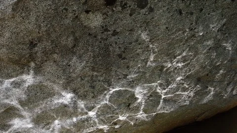 Sparkling sunlight reflections from river water surface caustics on rock Stock Footage 95927695
