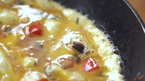 Sparkling vegetable omelet, pan stew, bubbling Stock Footage 168730432
