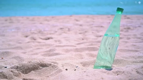 Sparkling Water Bottle in the Beach Stock Footage 173798140
