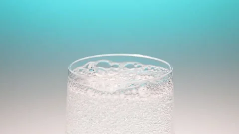 Sparkling Water Bubbles in Blue Gradient Stock Footage 256764033