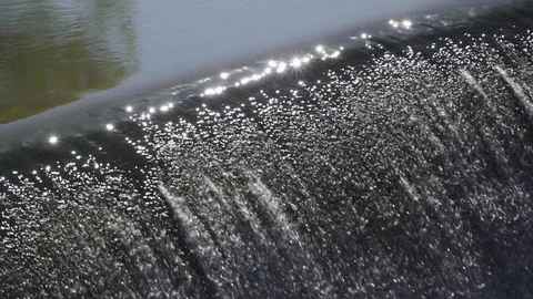 Sparkling water falling over a dam in slow motion Stock-Footage 89631260
