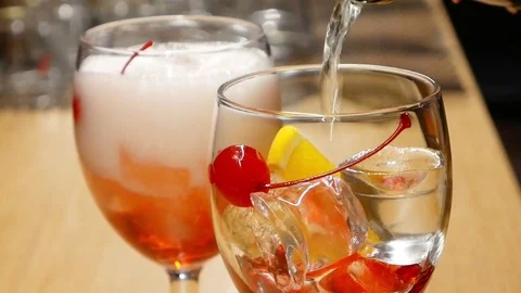 Sparkling water over ice, lemon and cherry. Stock Footage 71246864