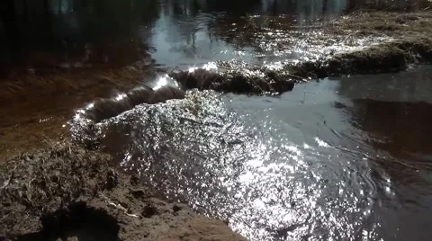 Sparkling water in the sun Stockbeeldmateriaal 48013435