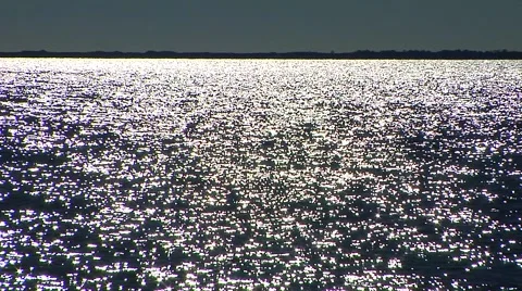  Sparkling waves moving right to left Stock Footage 57703567