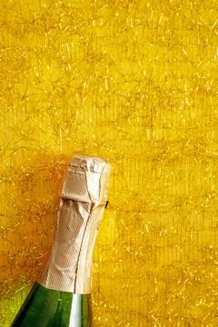 Sparkling wine bottle on festive backdrop Stock Photos