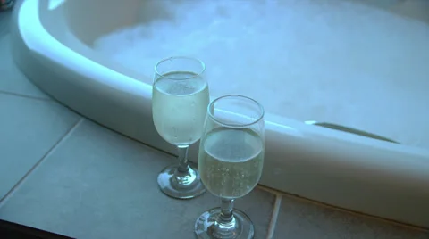 Sparkling Wine by Bubble Bath Stock Footage 35290014