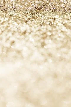 Sparkly gold glitter background texture Stock Photos