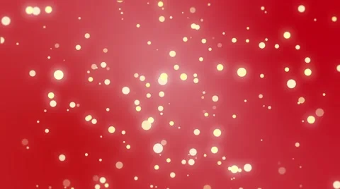 Sparkly light particles moving across a red gradient background Stock Footage 65132126