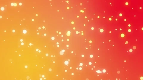 Sparkly light particles moving across a yellow orange red gradient background 스톡 동영상 65236219