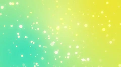 Sparkly light particles moving across a teal yellow gradient background Stock Footage 65236223