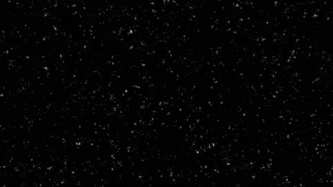 Sparkly particles falling down floating on black background. Glittering Vidéo 222447968