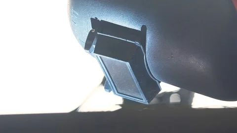 Sparks and light on welding mask Stock Footage 87586232