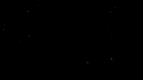 Sparks on black background Stock Footage 74373733
