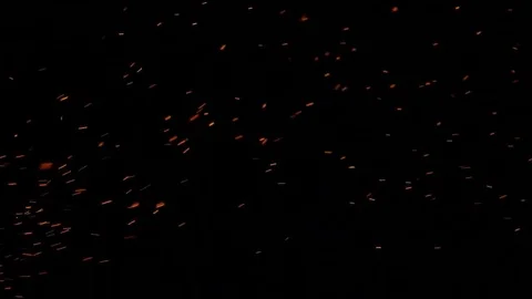 Sparks on black background Stock Footage 74375806