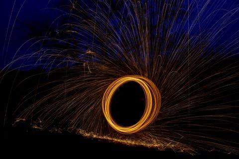 Sparks on a black background Stock Photos