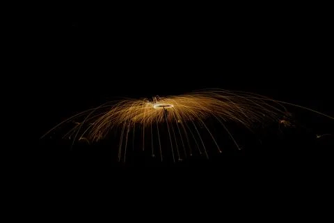 Sparks on a black background Stock Photos