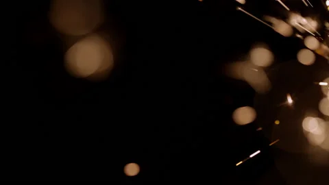 Sparks With Bokeh Effects In The Dark Stock Footage 233460006