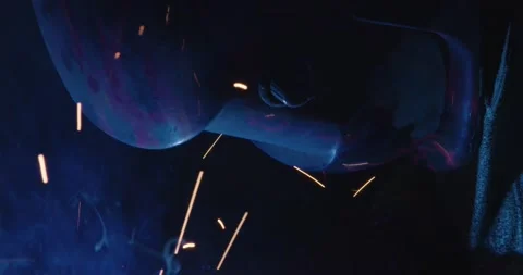 Sparks bouncing from a welder's helmet. Stock Footage 146420990