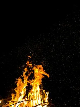Sparks of a burning campfire Stock Photos