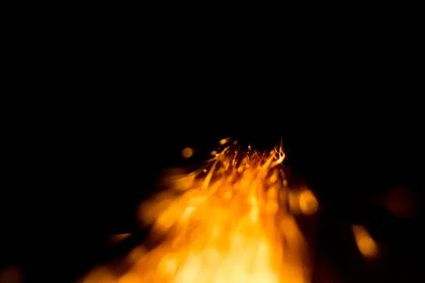 Sparks comet like in dark Stock Photos