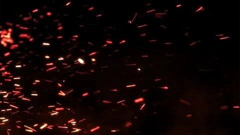 The sparks on a dark background Stock Illustration