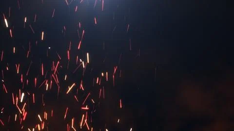 The sparks on a dark background Stock Illustration