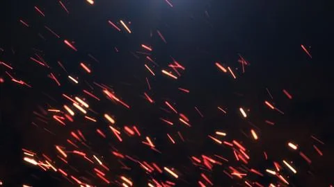 The sparks on a dark background Stock Illustration