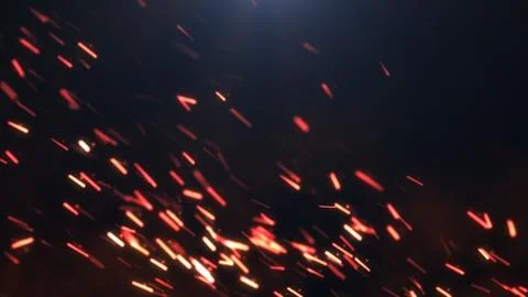 The sparks on a dark background Stock Illustration
