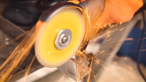 Sparks during the cutting of metal by an angle grinder. Stock Footage 74871788