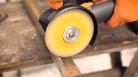 Sparks during the cutting of metal by an angle grinder. Stock Footage 74871944