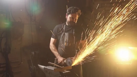 Sparks during cutting of metal angle grinder. Slow motion Stock Footage 77384747
