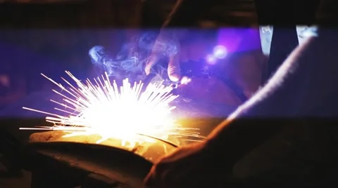 Sparks during welding metal Stock Footage 65773093