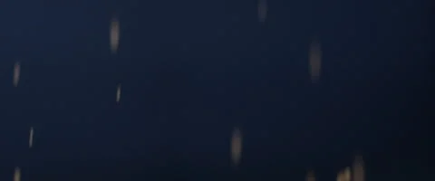 Sparks falling against black background Stock Footage 67029127
