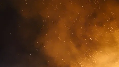 Sparks from the fire on the background of the night sky. Stock Footage 112262894