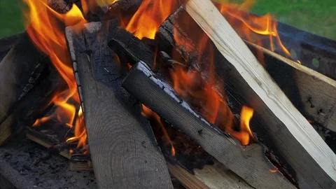 Sparks fire cracks in grill fire pit. Burning ash rise from large fire. 動画素材 71129167