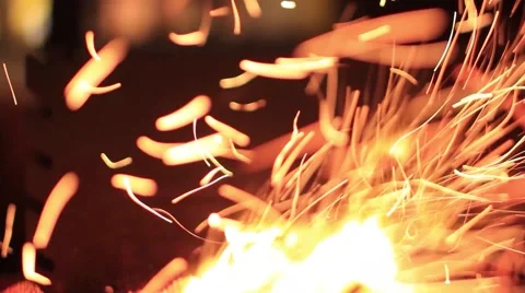 Sparks fire cracks in grill firepit Stock Footage 49134141