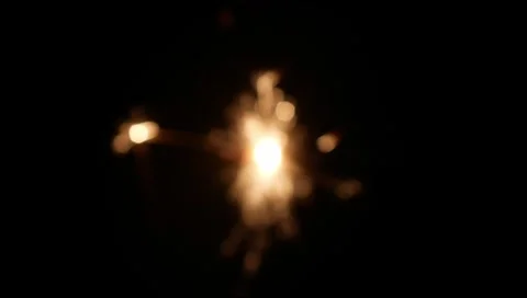 Sparks on firecrackers on a black background. Stock Footage 306772216