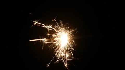 Sparks on firecrackers on a black background. Stock Footage 306772293