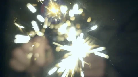 Sparks from flint from a set of survival is fall down and ignites the gasoline 動画素材 64717826