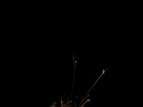 Sparks fly up from the bottom of the screen Stock-Footage 75899467