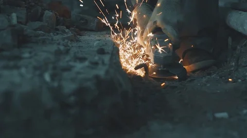 Sparks fly from the grinder in slow motion Stock Footage 96488921