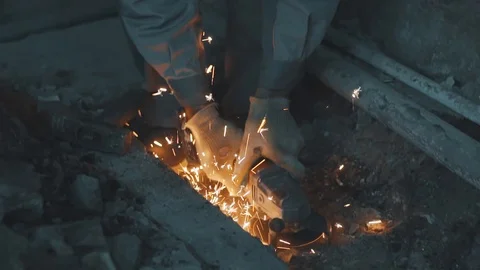 Sparks fly from the grinder in slow motion Stock Footage 96488930