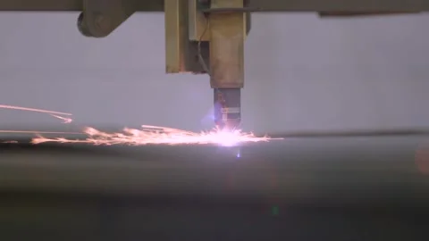 Sparks Fly as Laser Cutting Machine Tool operates in Automation Facility. Stock Footage 136784398