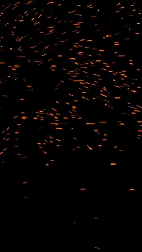 The sparks fly out of fire. Isolated on black background. 動画素材 332737760